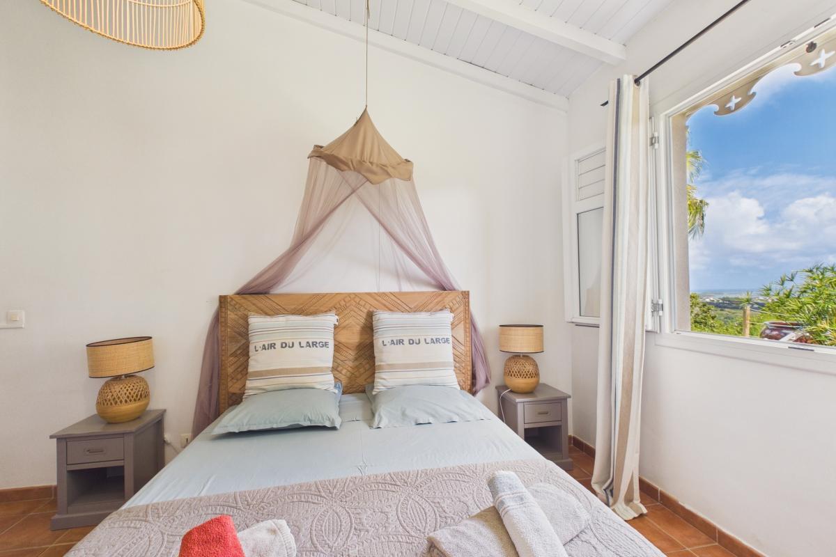 Location villa 6 personnes martinique suite parentale vue lit